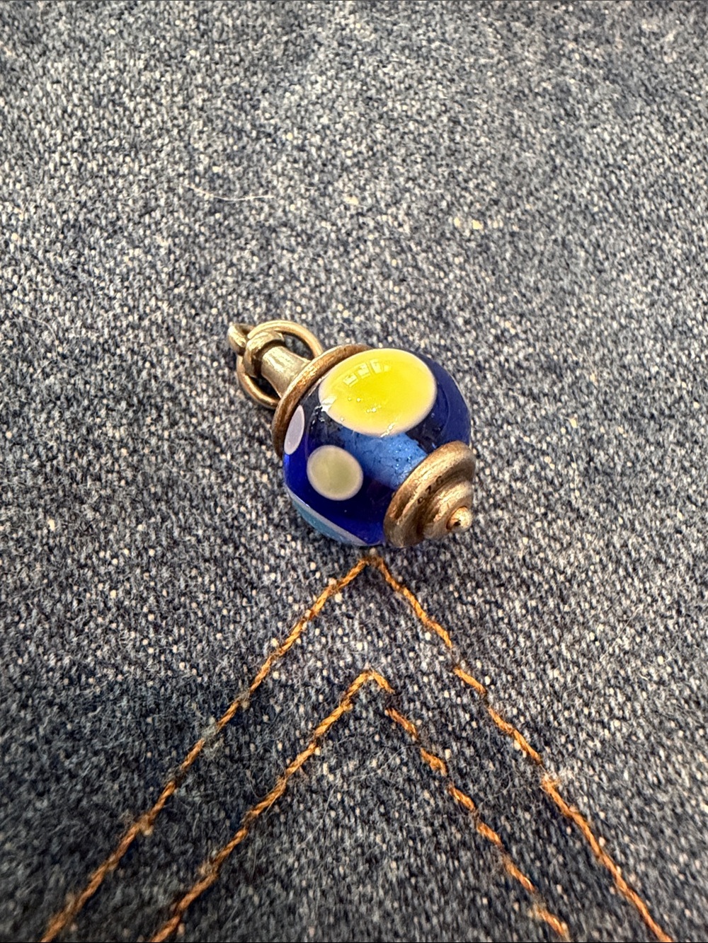 Retired James Avery blue dot glass finial charm